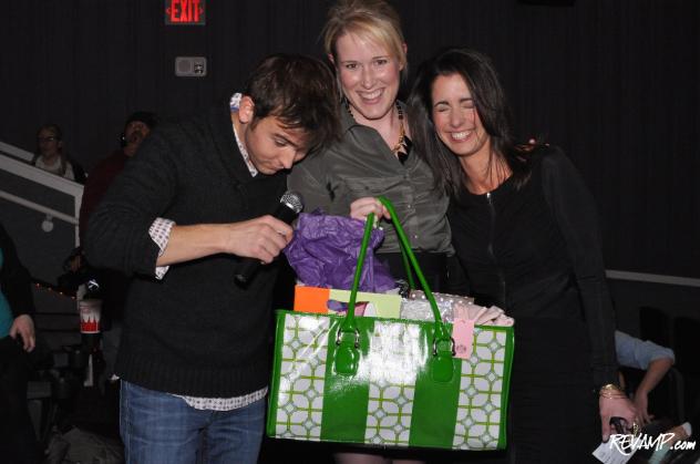 94.7 Fresh FM's Tommy McFly and CityShopGirl's Kelly Collis ceremoniously present winner Lindley Thornburg with her 'morning after' prize bag!